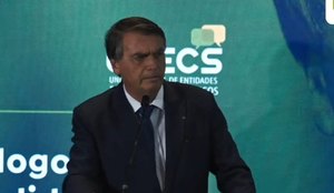 Bolsonaro com o ministro do Trurismo, Gilson Machado, na garupa