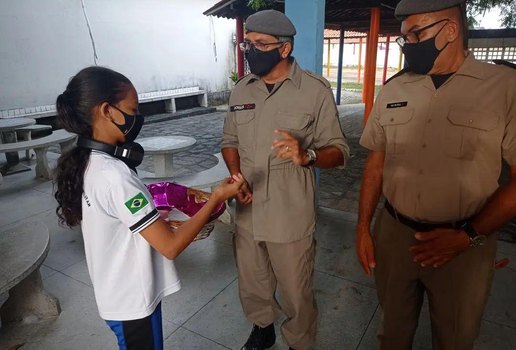 Aluna durante atividades com servidores, em João Pessoa.