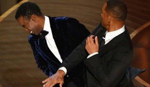 Will Smith pede desculpas a Chris Rock após tapa: "Inaceitável e imperdoável"