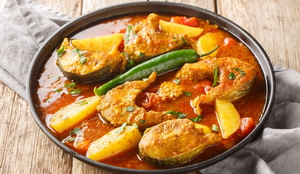 Peixe com curry e batatas (Imagem: Sergii Koval
| Shutterstock)