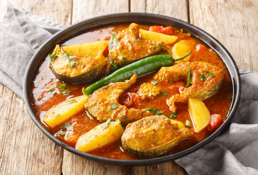 Peixe com curry e batatas (Imagem: Sergii Koval
| Shutterstock)