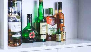 Alcohol bottles on shelf