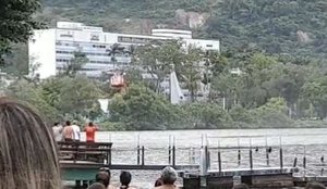 Helicóptero cai com cinco pessoas em lagoa no RJ