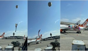Balão cai e cobre parte de avião no aeroporto de Guarulhos; veja vídeo