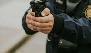 Pistola de policial atirante ideogram