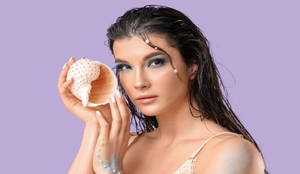 Tons azulados, pele iluminada e brilho molhado compõem o look conhecido como mermaidcore (Imagem: Pixel-Shot | Shutterstock)